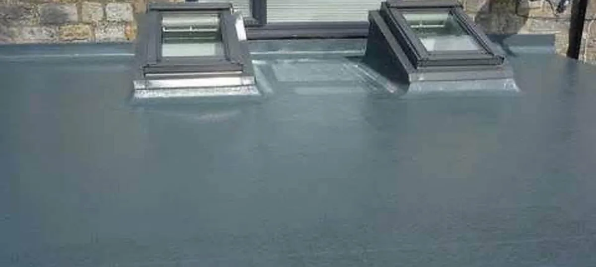Seamless GRP fibreglass roof with two rooflights, finished in grey